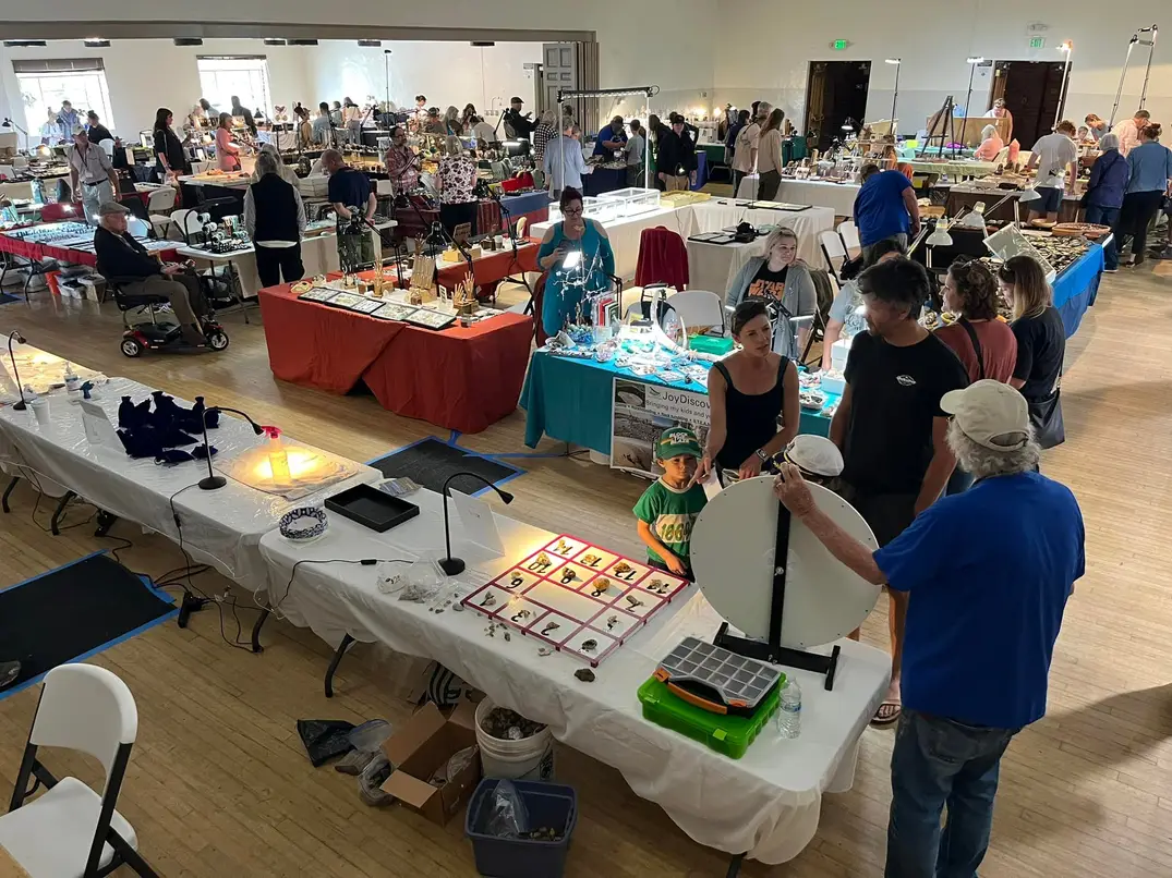 people looking at vendor booths at a gem and mineral show in San Luis Obispo, California