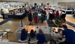 San Luis obispo gems by the sea view of vendors from the stage with crowds